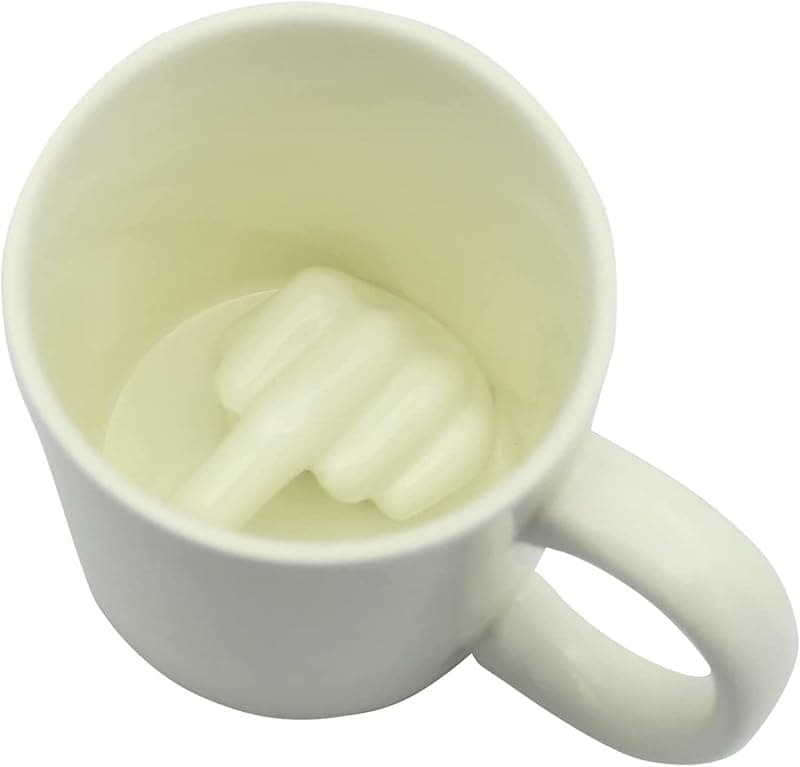 Tasse en céramique avec animal caché à l'intérieur